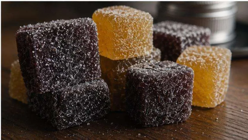 Assorted cannabis edibles including chocolate and gummies